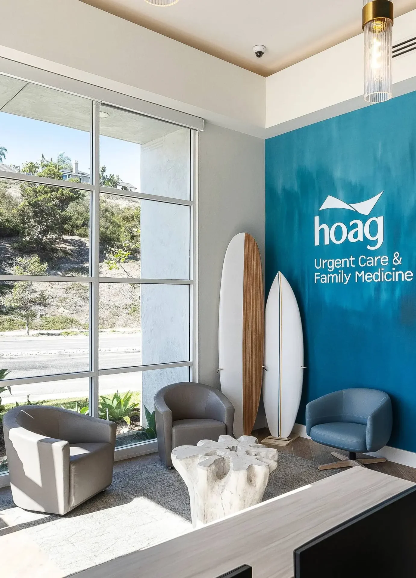 Medical office waiting area with surfboards.