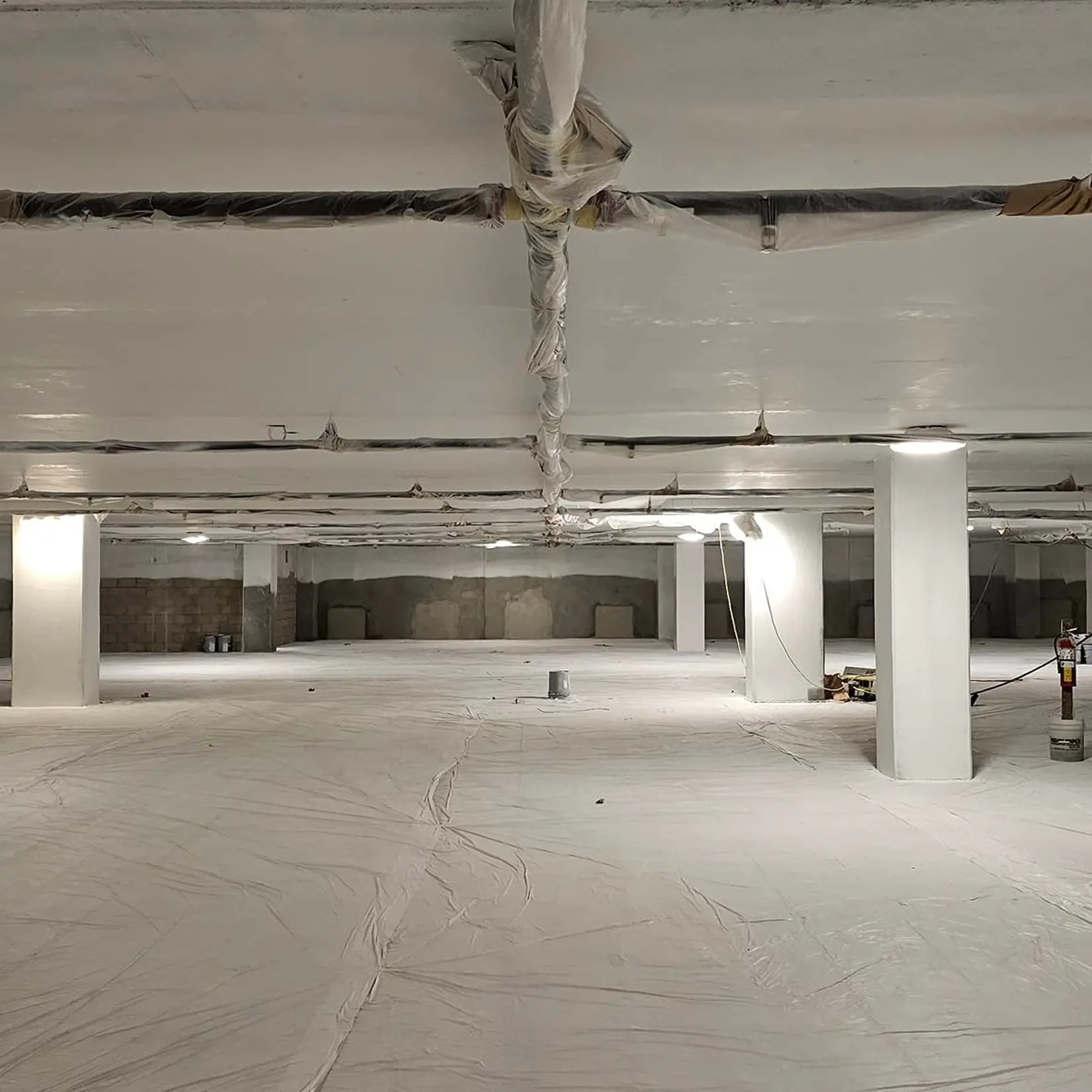 Spacious industrial basement under construction.